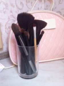 My makeup brushes in a plastic jar